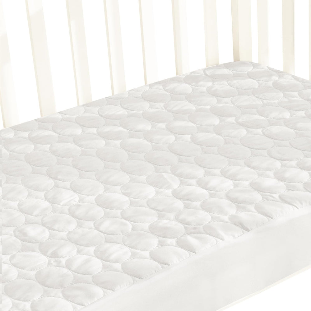 Biloban waterproof crib mattress protector guards against leaks for peaceful sleep