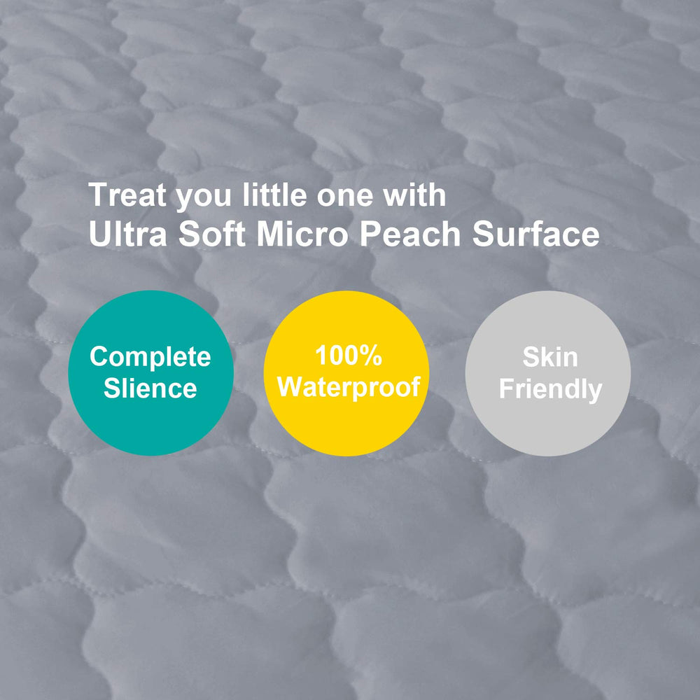 Biloban waterproof mattress pad showing absorbent layer to keep playards dry