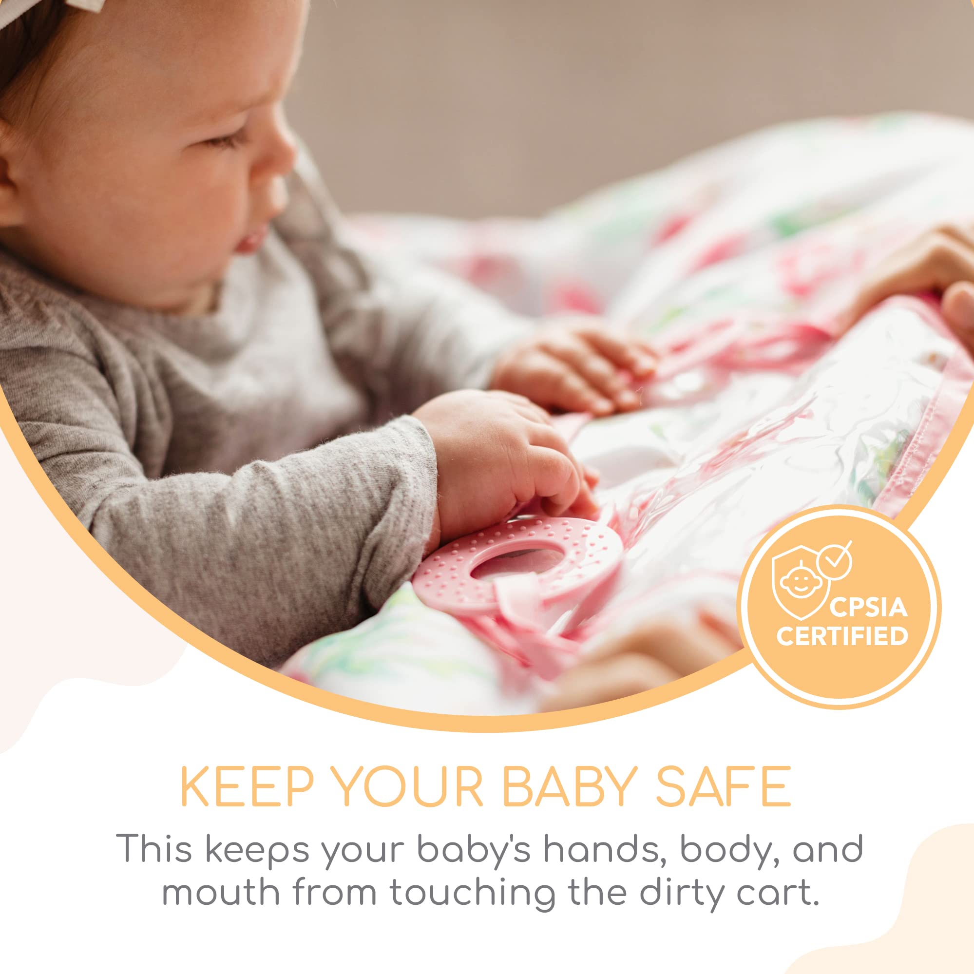 Binxy Baby Cart Cover with attached toy rings keeps baby entertained.