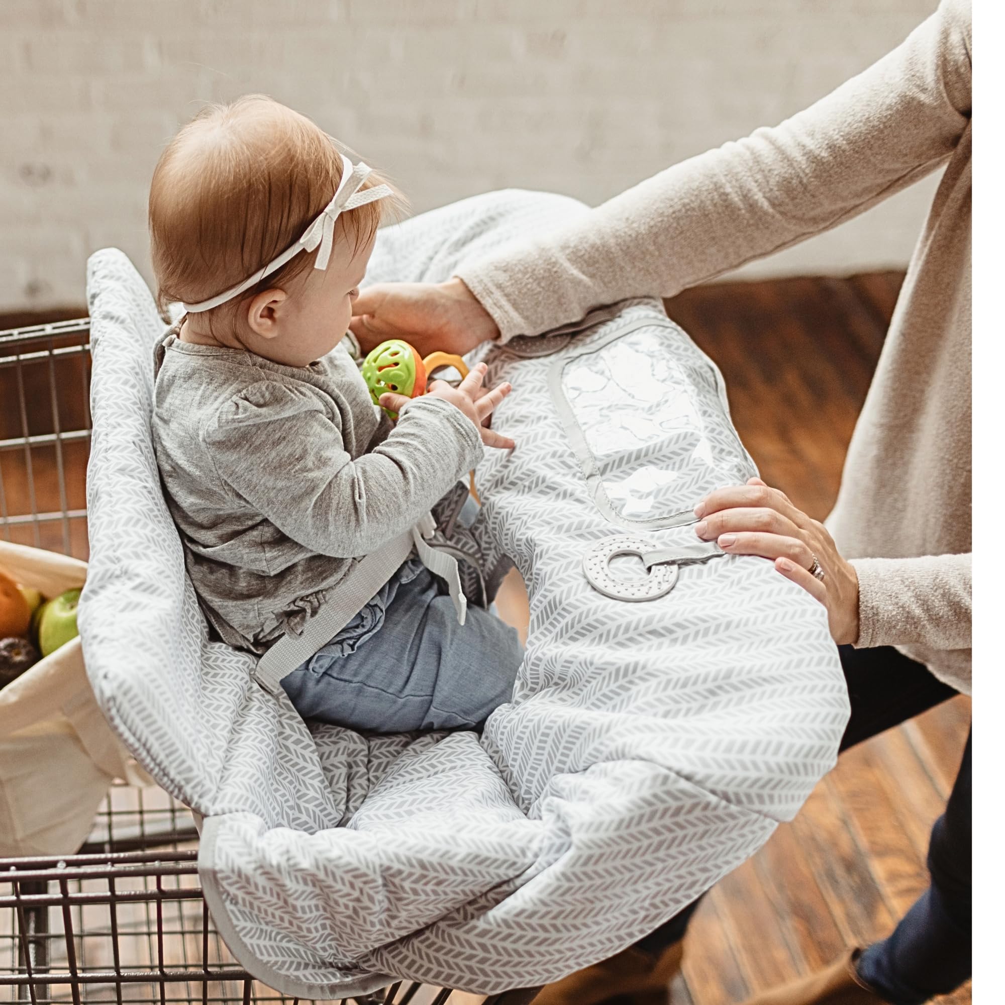 Binxy Baby universal-fit cart cover protects your child on various carts.