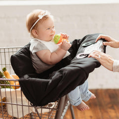 Binxy Baby padded cart-seat cover keeps little one comfy on aisles