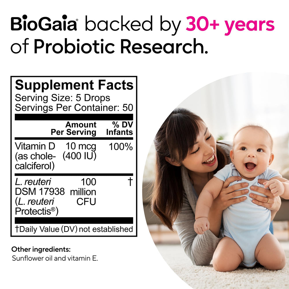 Calm baby with BioGaia Drops nearby.