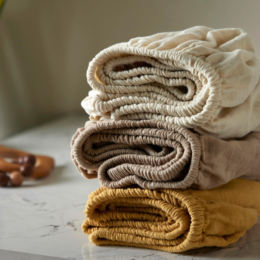 BIOWEAVES Bassinet Sheet Deep Pocket—secure fit for 4-inch deep mattresses, reducing sheet shift.