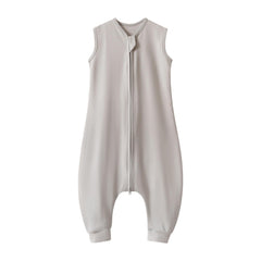 Blackleaf Baby toddler sleep sack with feet in grey, lying flat for cozy nights.