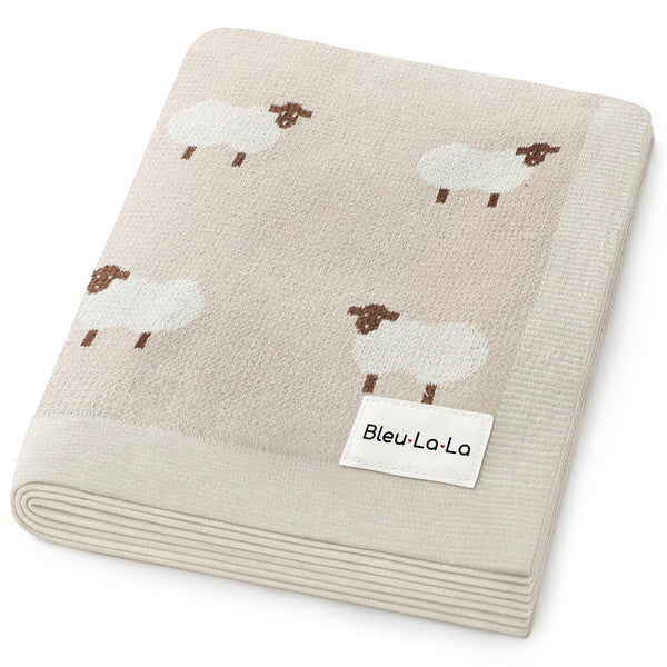 Bleu La La sheep-themed baby swaddle blanket in khaki for cozy newborn snuggling.