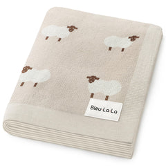Bleu La La sheep-themed baby swaddle blanket in khaki for cozy newborn snuggling.