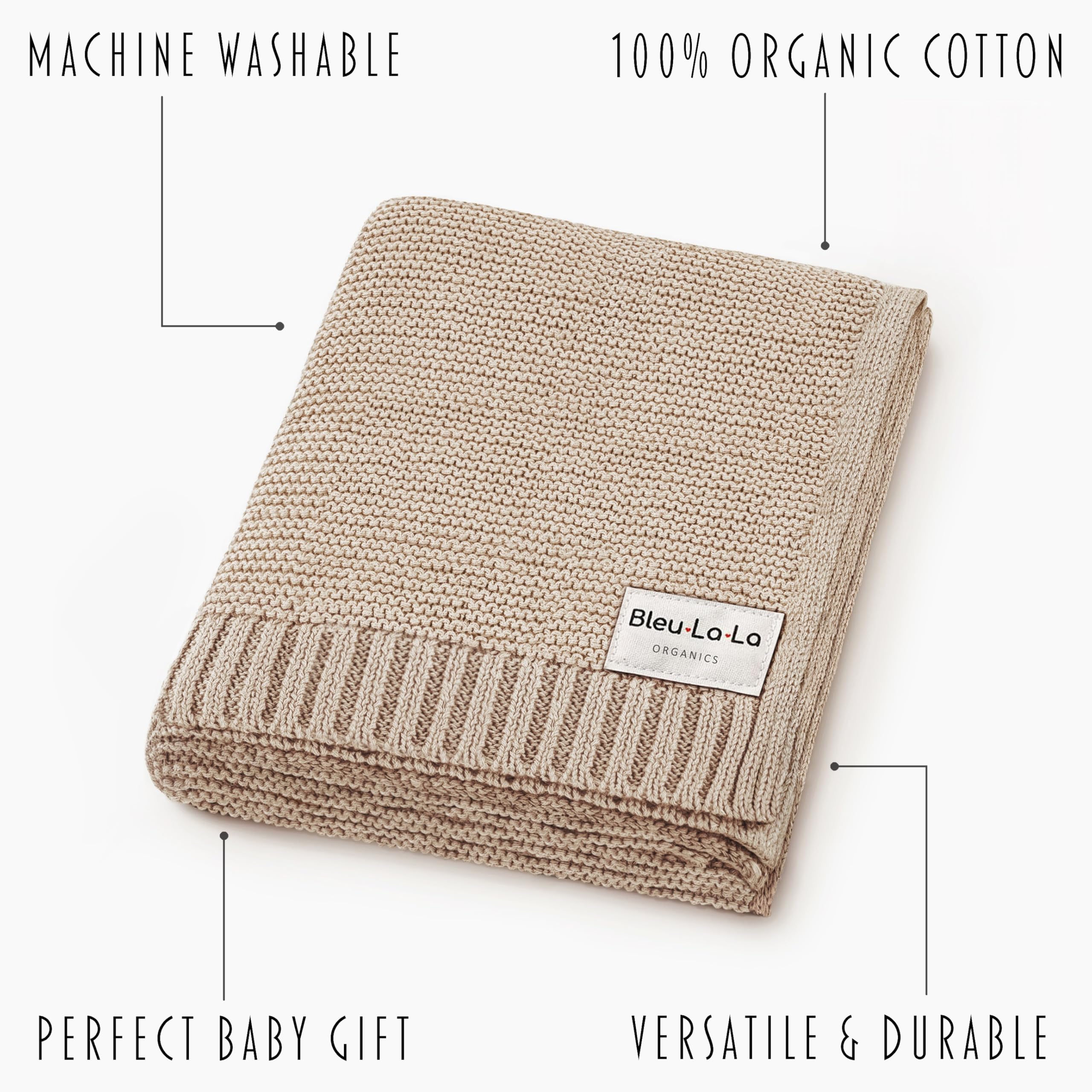 Baby swaddled in Bleu La La heritage knit blanket for cozy year-round comfort.