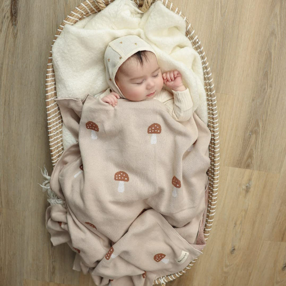 Bleu La La blanket wrap-demo showing easy swaddling and snug comfort