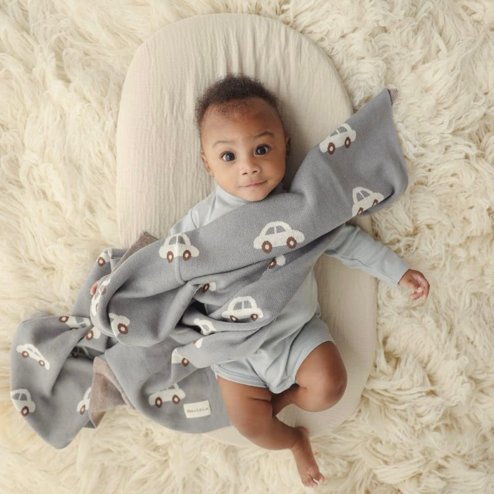 Bleu La La cotton knit blanket close-up showcases buttery softness