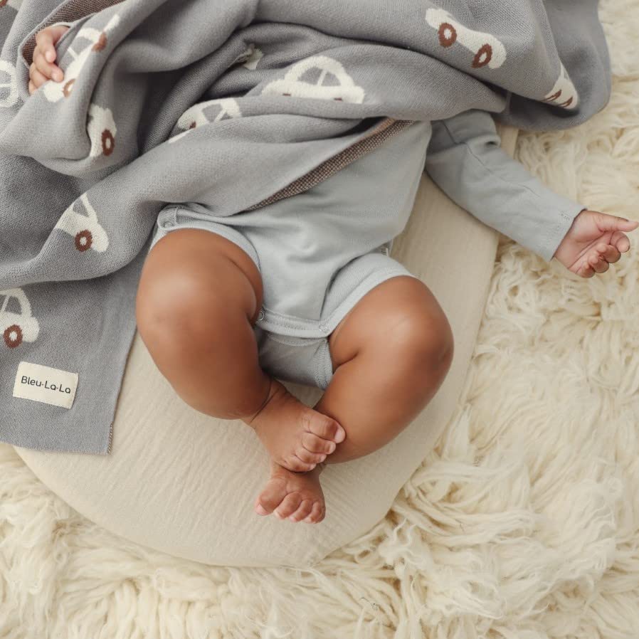 Bleu La La gift-ready blanket wrapped with monogram ribbon