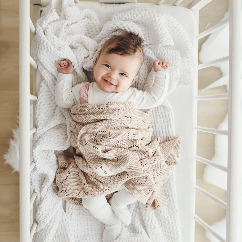 Bleu La La Heirloom Knit Heart Blanket in nursery décor adds soft warmth and charm