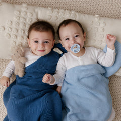 Heritage Knit swaddle close-up in denim blue showing soft organic cotton fibers