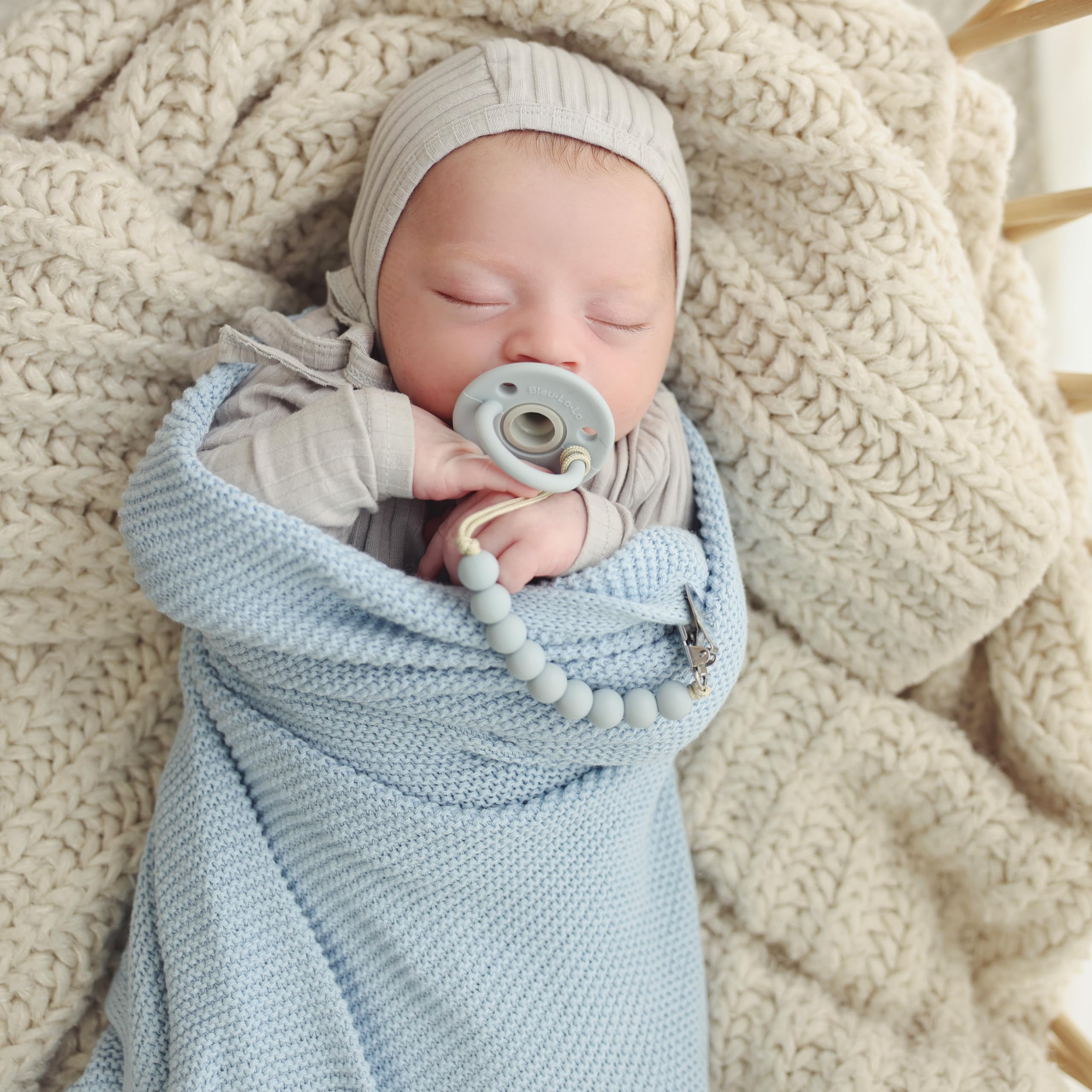 Machine-washable Bleu La La swaddle in denim blue after a spill test