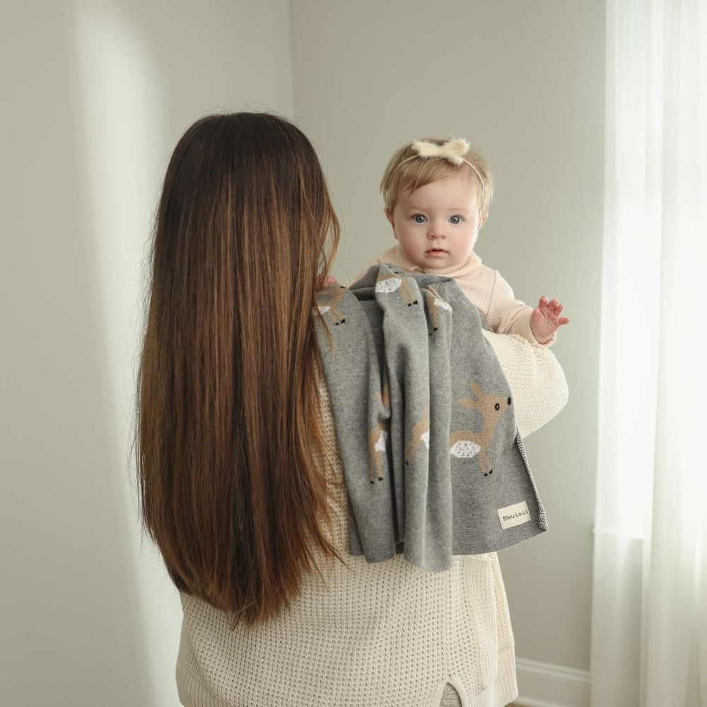 Bleu La La swaddle on a bedside setting highlighting portability