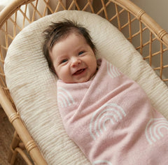 Bleu La La Knit Baby Swaddle Rainbow Pink cotton texture close-up highlights natural softness.