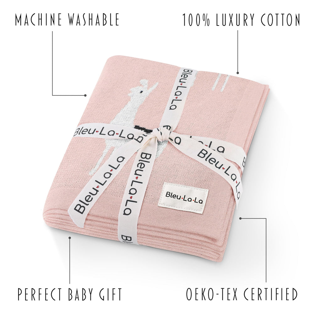 Bleu La La llama pink knit blanket fabric closeup highlighting soft cotton texture.