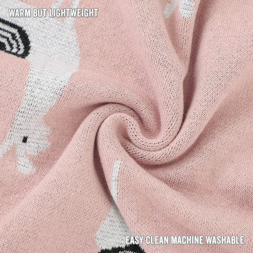 Bleu La La llama pink knit blanket folded for compact storage.