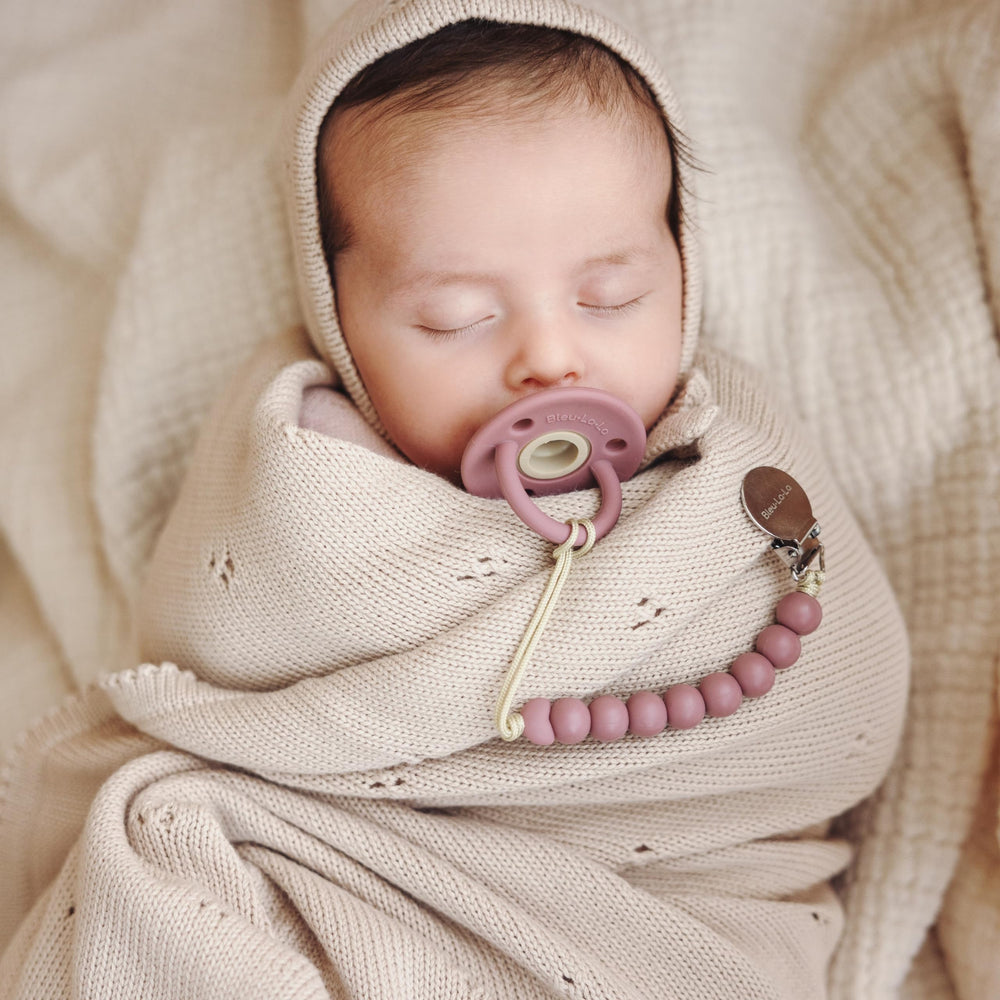 Bleu La La Machine-washable blanket promises easy cleaning and durable softness.
