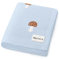Bleu La La Mushroom Blue blanket close-up texture, buttery soft cotton for delicate skin.