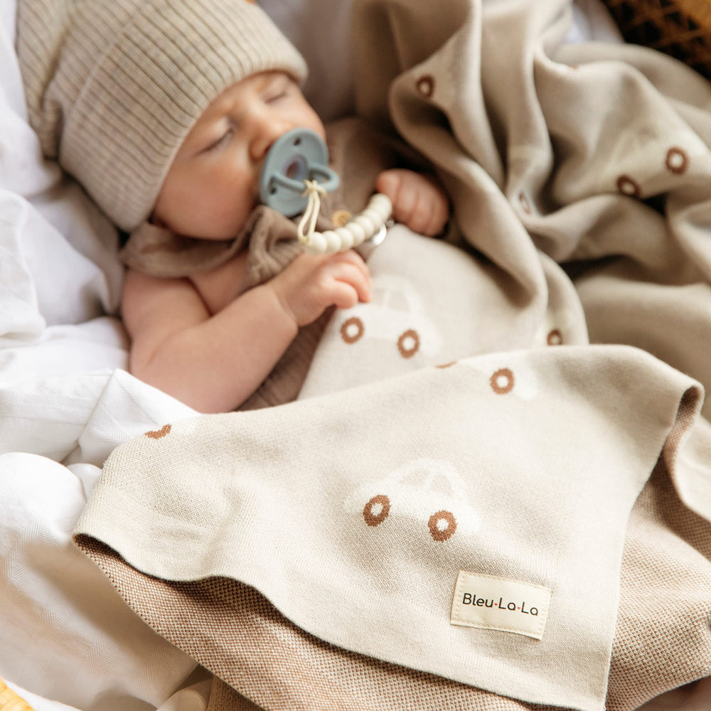 Bleu La La nursery decor adds a timeless gender-neutral touch