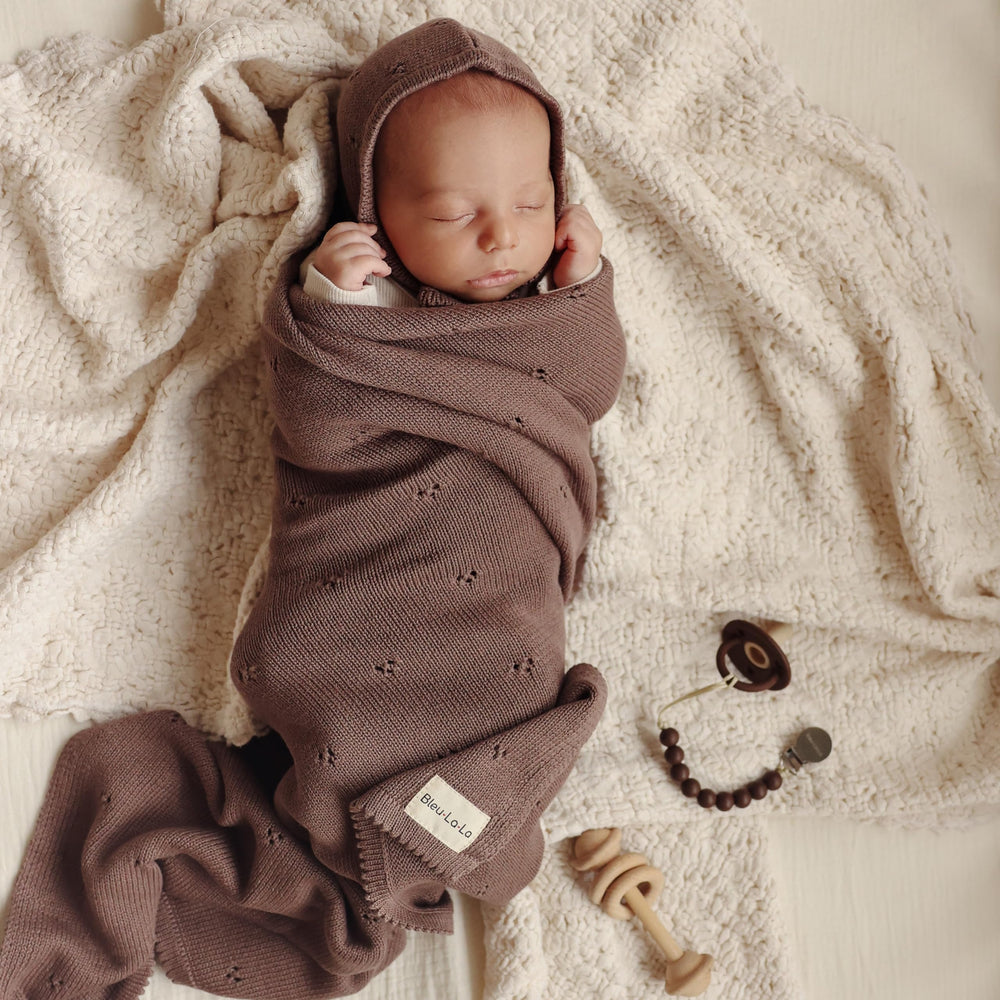 Bleu La La Organic Cotton Knit blanket highlights breathable, soft fibers.