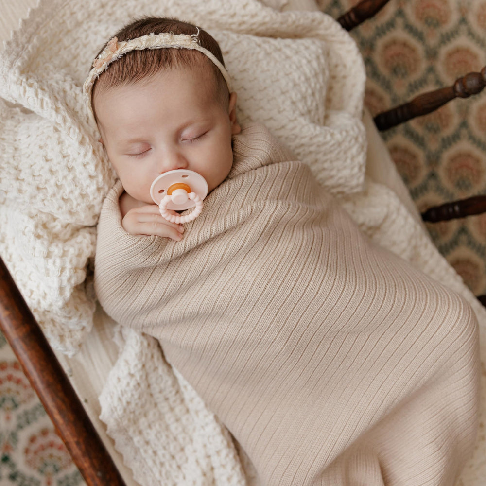 Bleu La La organic cotton swaddle care shot, machine washable and durable.