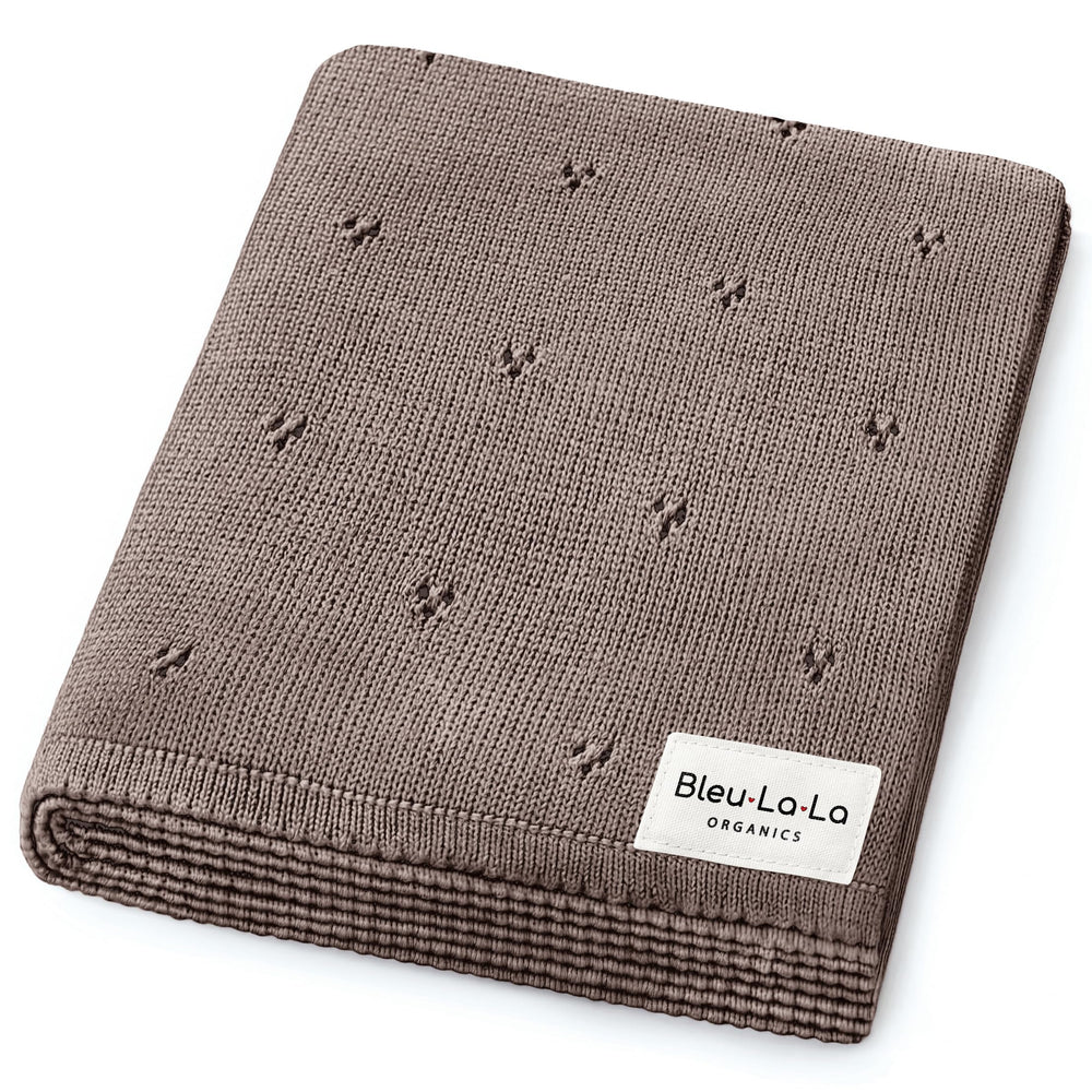 Bleu La La Pointelle Swaddle in Mocha offers gentle, cozy newborn wrapping.