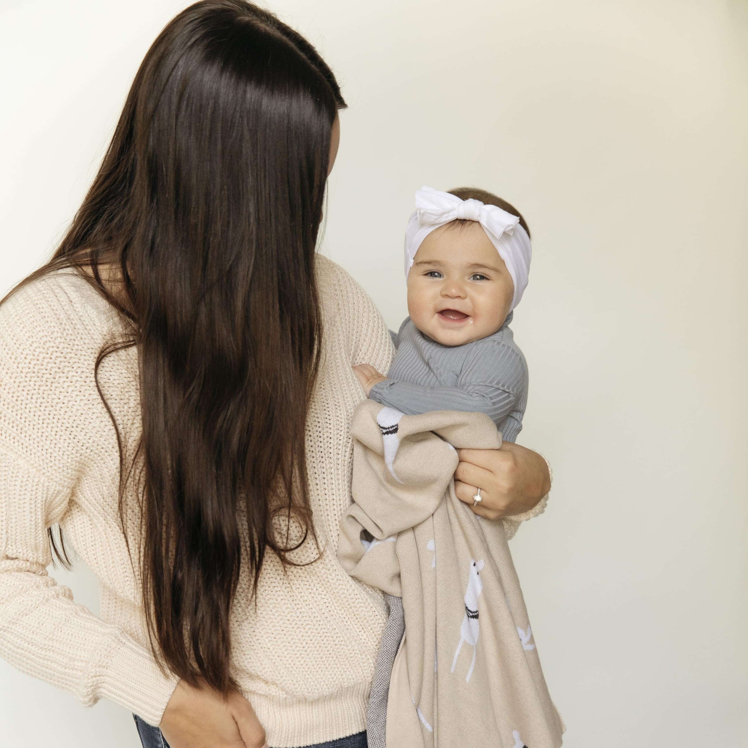 Bleu La La blanket in stroller shows versatile all-season warmth for outings.