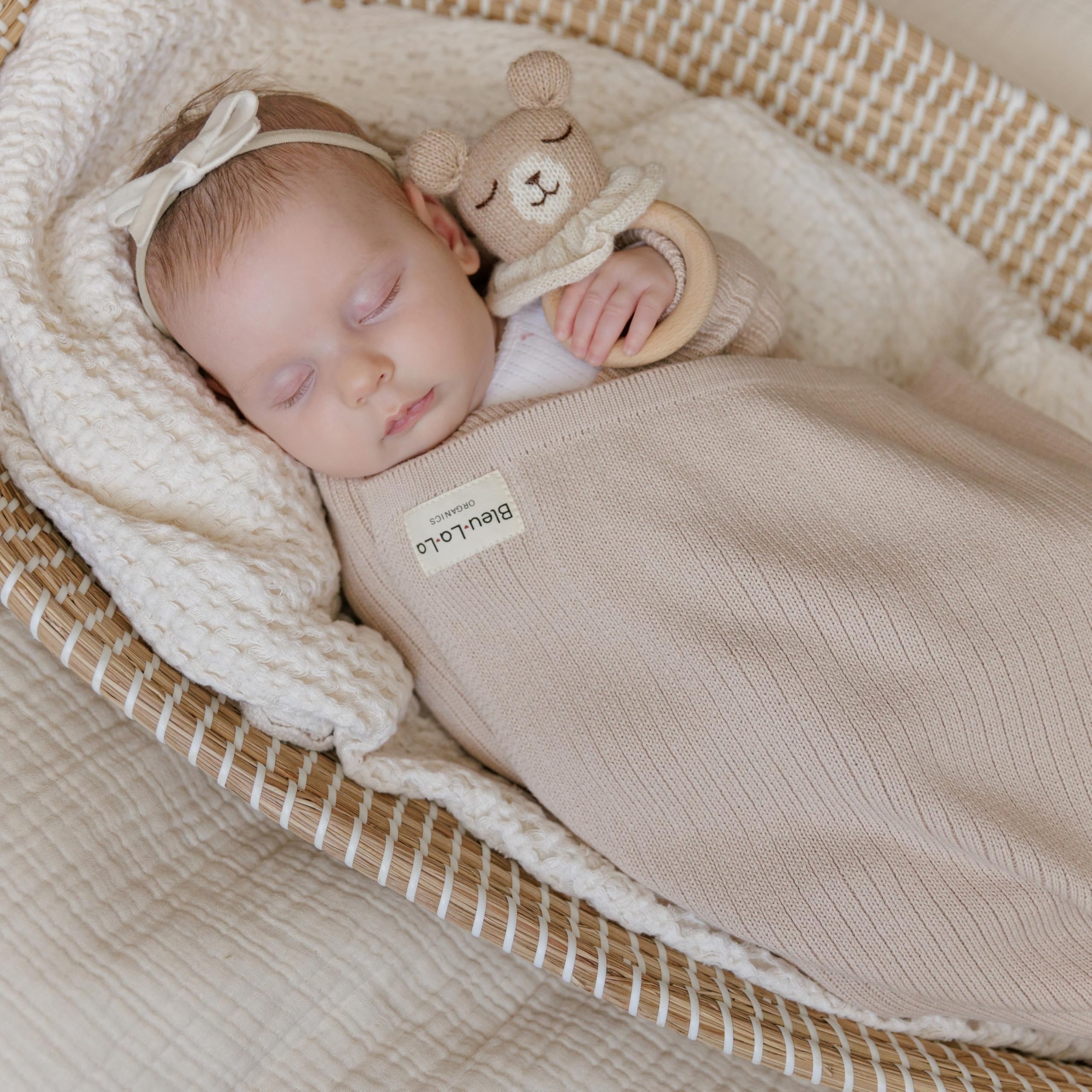 Bleu La La swaddle blanket bed times snuggle close-up in oatmeal.