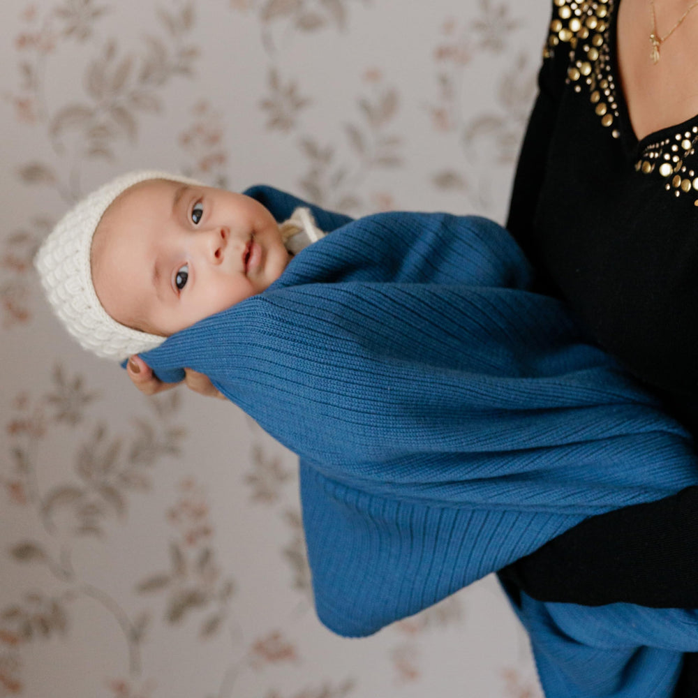 Gift wrap monogram on Bleu La La swaddle offers ready-to-gift presentation