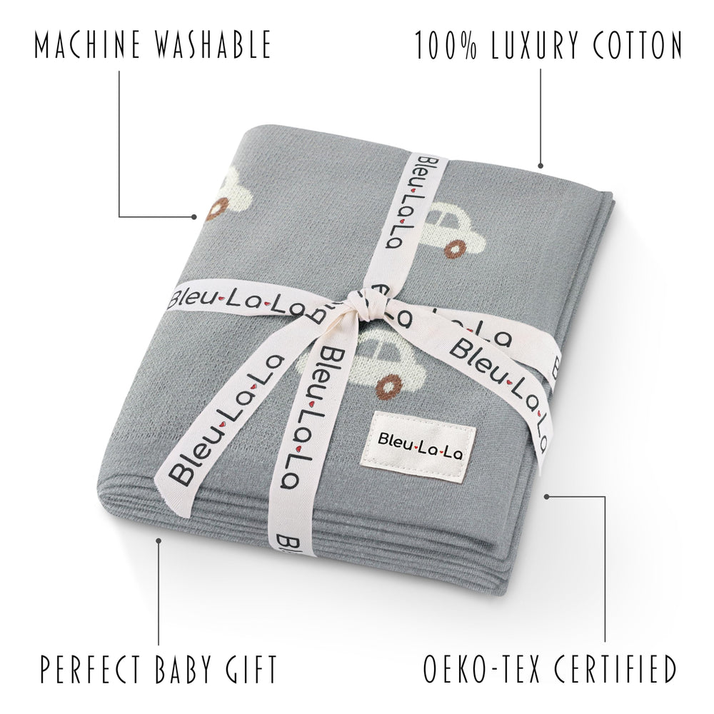 Bleu La La swaddle in nursery demonstrates versatile cozy use for newborns