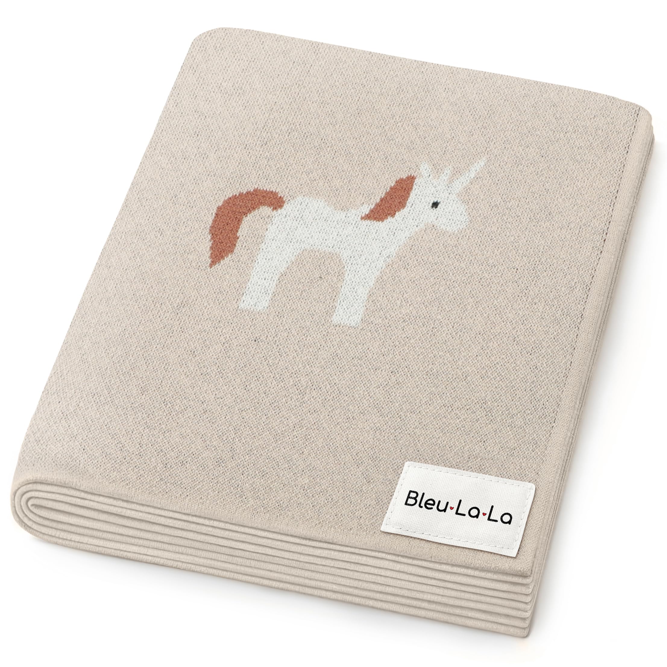 Bleu La La Unicorn Cream blanket closeup showing buttery softness and breathable cotton.