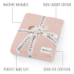 Bleu La La Unicorn Pink swaddle on a newborn for breathable comfort.