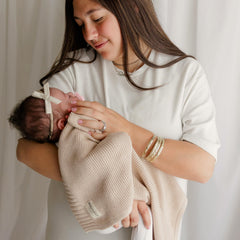 Bleu La La unisex oatmeal knit blanket complements any nursery decor.