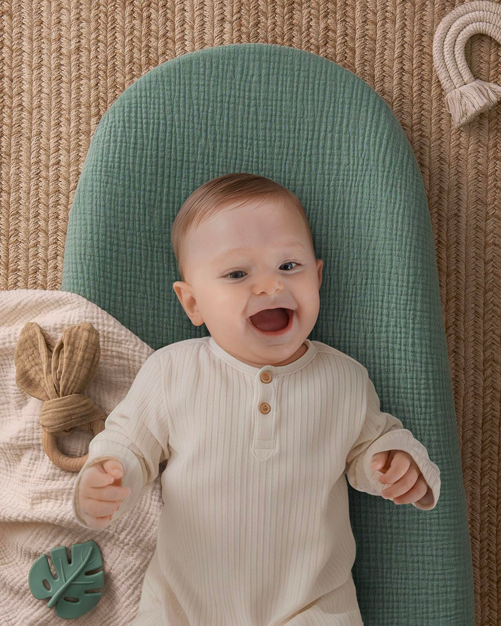 Blissful Diary anti-roll sides with quick-release belt for baby safety.