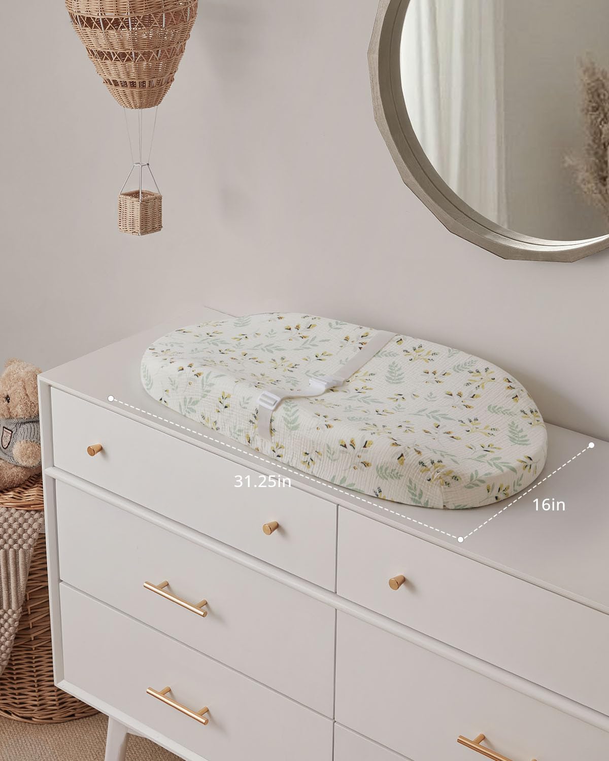 Blissful Diary anti-roll sides help keep baby secure during changes.