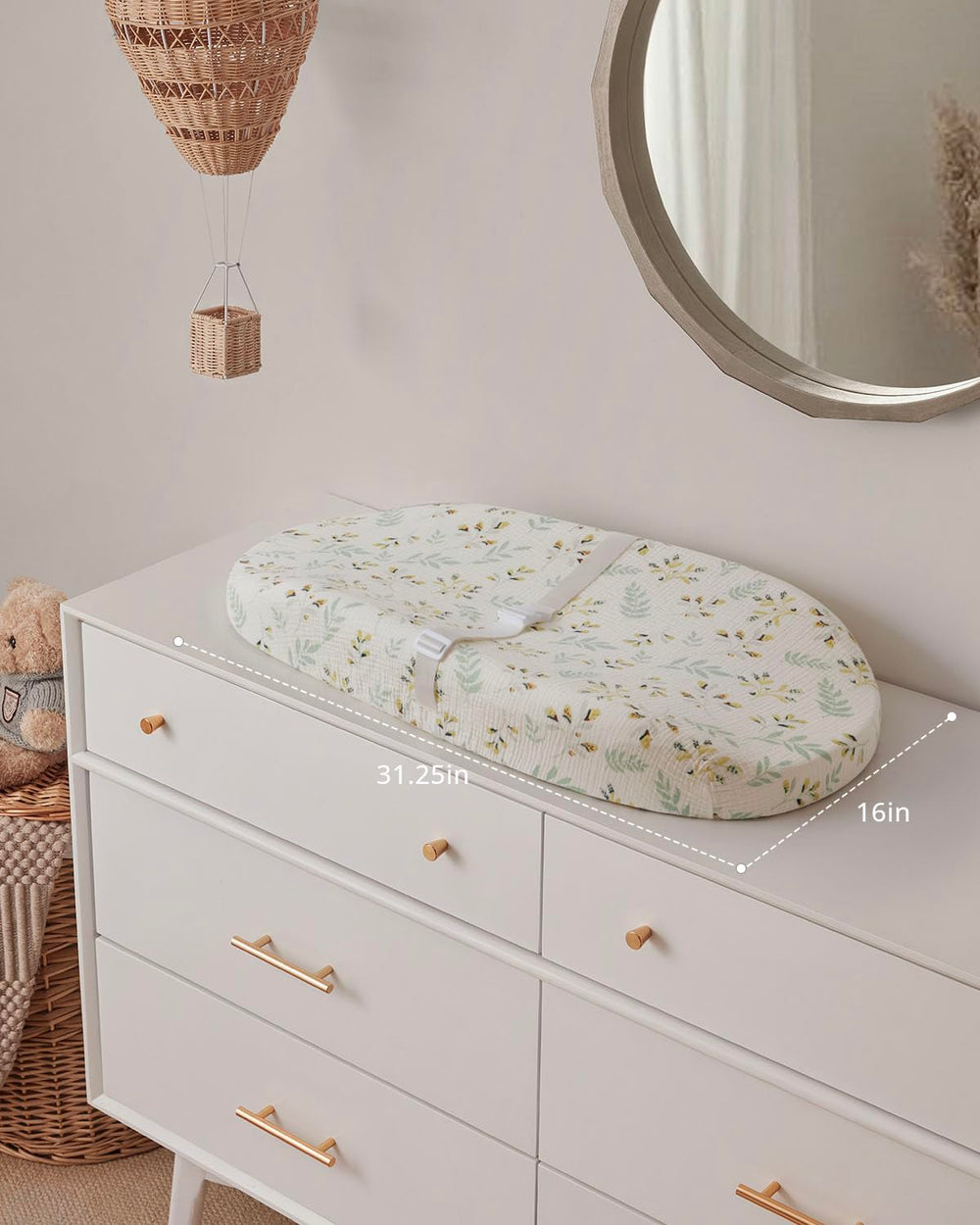 Blissful Diary anti-roll sides help keep baby secure during changes.