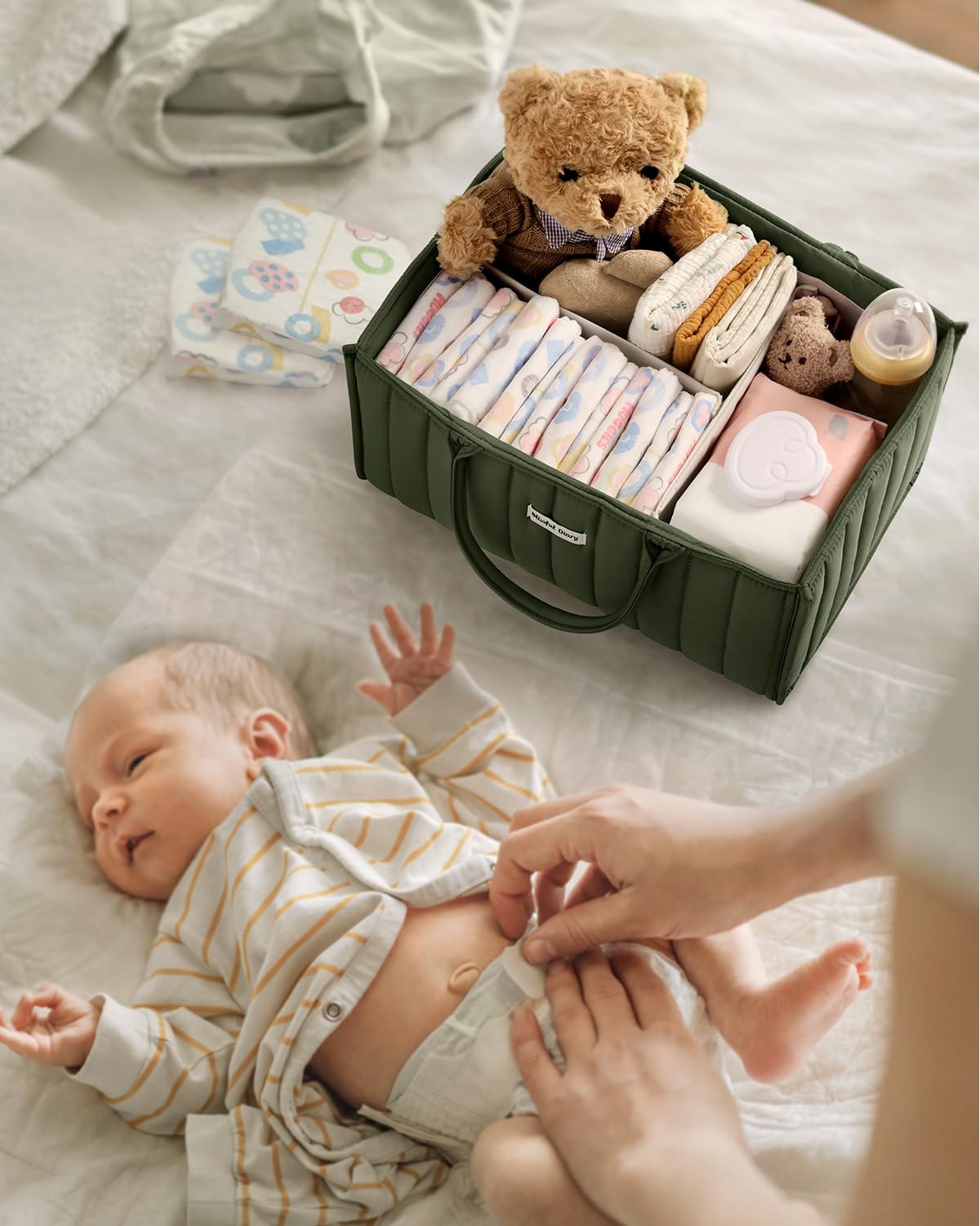 Compact Blissful Diary baby caddy for organizing breast pump parts and accessories.