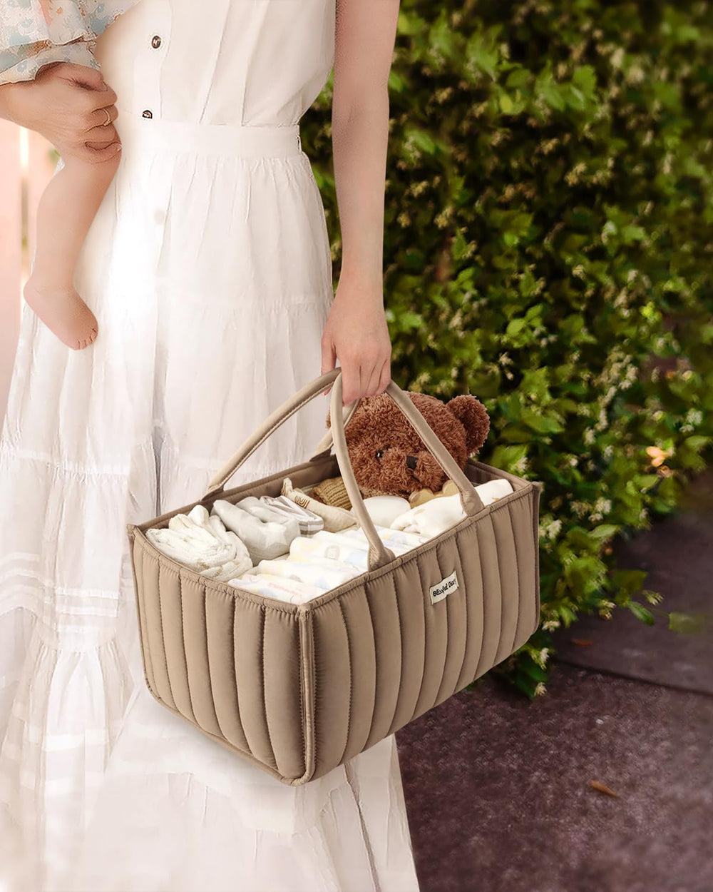 Blissful Diary diaper caddy stores breast pump parts neatly and accessibly.