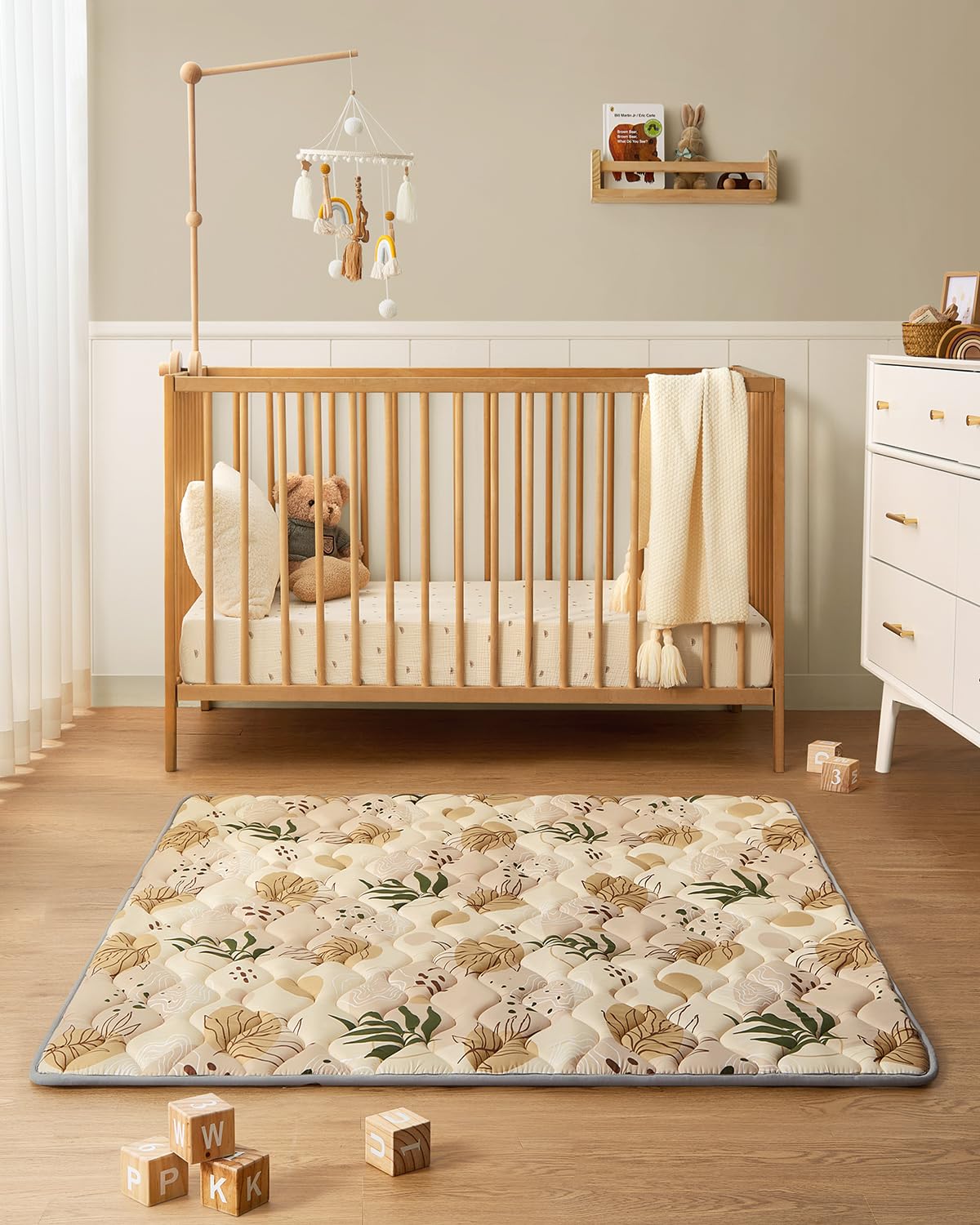 Earth-tones palette suits contemporary decor while keeping baby comfortable.