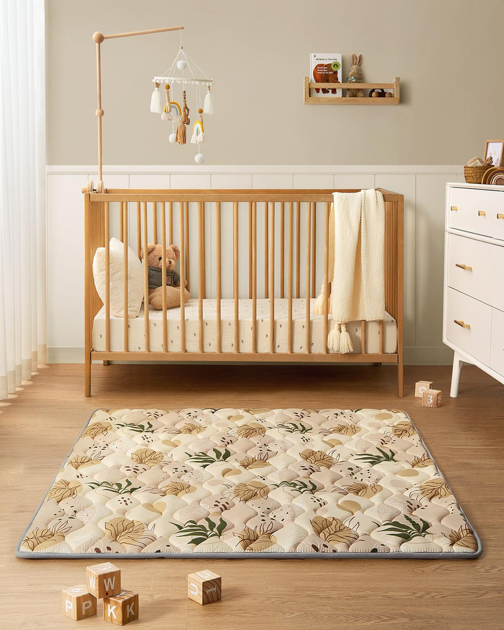 Earth-tones palette suits contemporary decor while keeping baby comfortable.