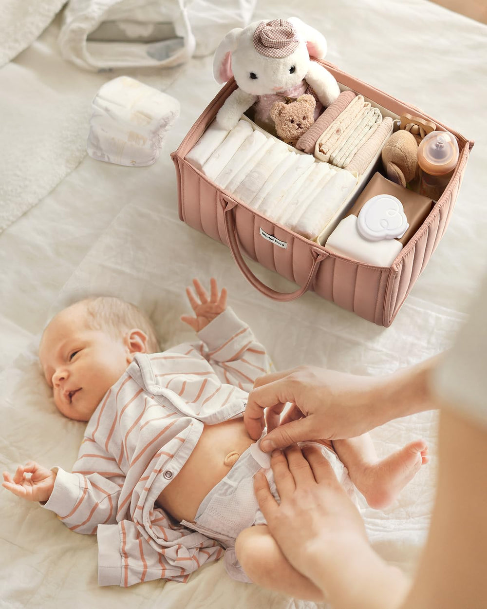 Blissful Diary baby shower gift idea with practical newborn essentials.
