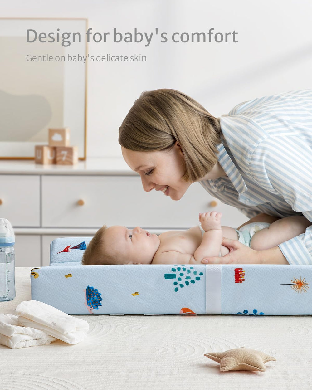 Blissful Diary contoured-sides keep baby secure during changes.