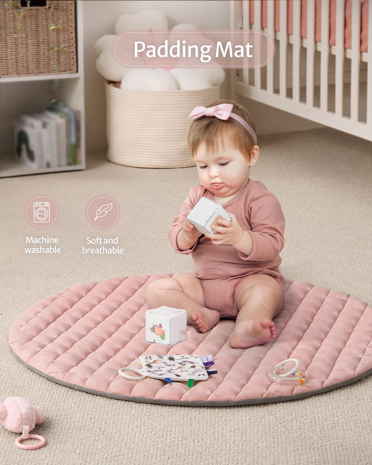 Crinkle pages and cloth book on Blissful Diary gym mat for tactile and visual interest.