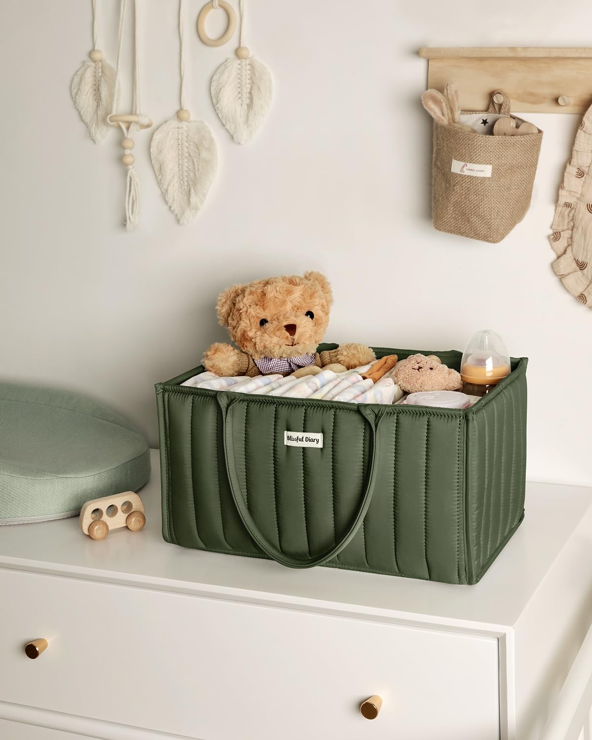 Blissful Diary multi-compartment diaper caddy simplifies packing and item separation.