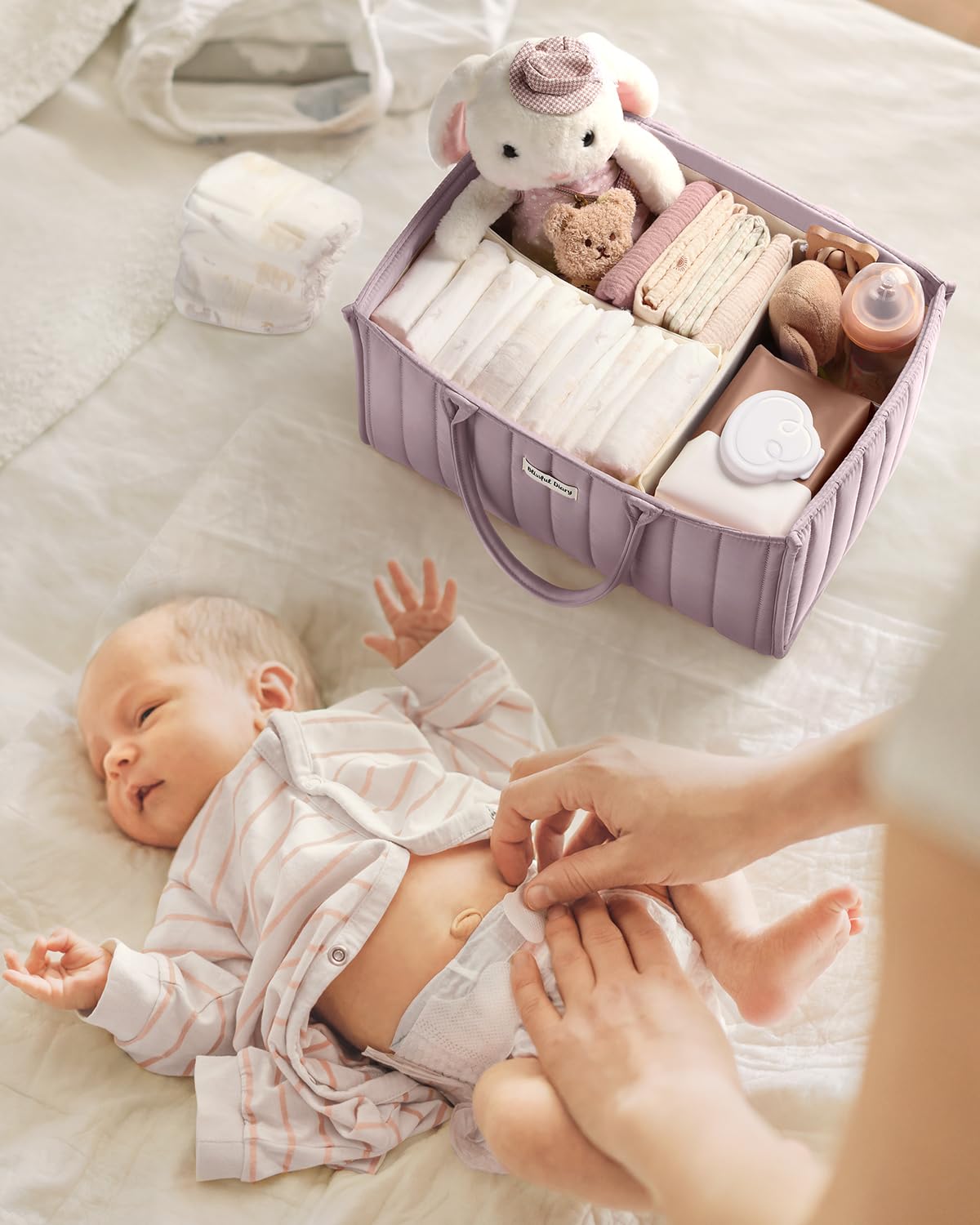 Blissful Diary mauve pink nursery basket adds style to changes.