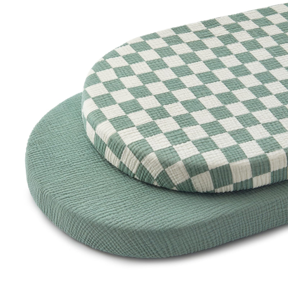 Blissful Diary muslin bassinet sheet in sage checkboard, breathable and gentle for baby sleep.