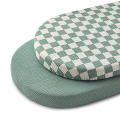 Blissful Diary muslin bassinet sheet in sage checkboard, breathable and gentle for baby sleep.