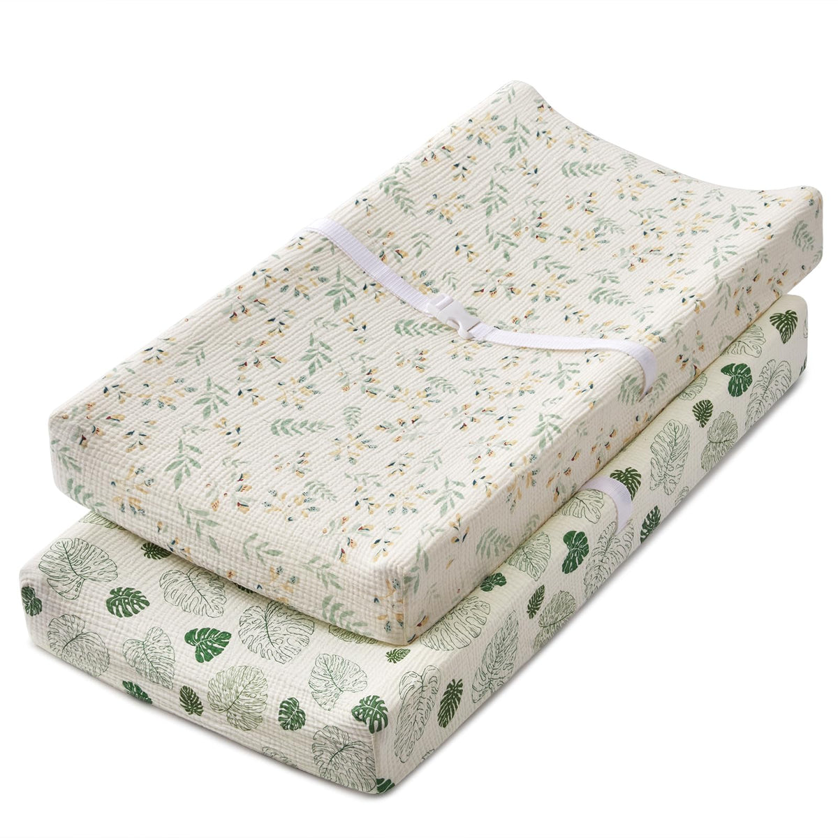 Blissful Diary leaf-print muslin changing pad cover for a soft, breathable changing surface.