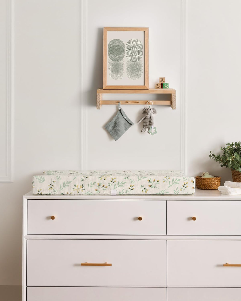 Neutral nursery styling with Blissful Diary changing pad cover for both girls and boys.